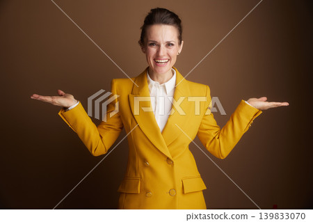 Welcoming Professional Woman with Open Gesture Welcoming Professional Woman with Open Gesture 139833070