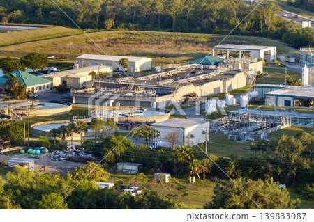 Water treatment facility at city wastewater cleaning plant. Purification process of removing undesirable chemicals, suspended solids and gases from contaminated liquid Water treatment facility at city wastewater cleaning plant. Purification process of removing undesirable chemicals, suspended solids and gases from contaminated liquid 139833087