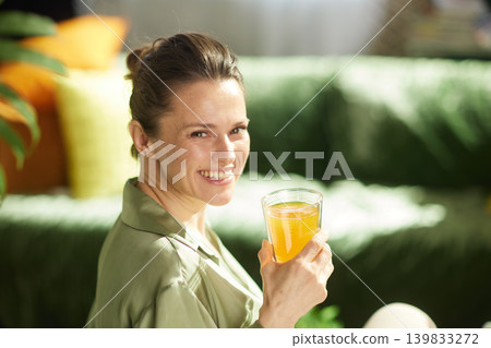 Smiling Woman with Healthy Morning Drink Smiling Woman with Healthy Morning Drink 139833272