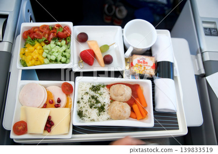 Above the clouds, May 10 2018: Pre arrival snack in premium economy on a flight to the USA 139833519