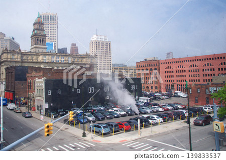 Detroit, United States, May 22 2018: Parking lot with steam rising from underground 139833537