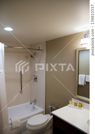 Chicago, United States, May 11 2018: Small bathroom with bathtub and shower curtain on Michigan Avenue 139833557