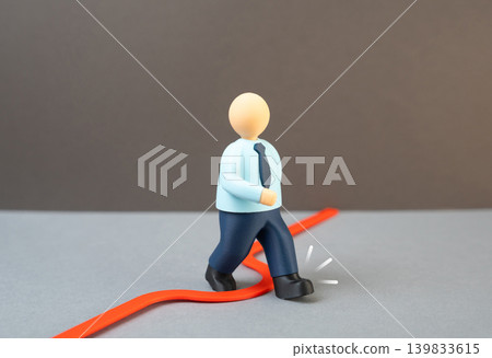 A person crosses a red line. Violation of boundaries. Overstepping a ban, challenging restrictions and showing initiative and unconventional thinking. A person crosses a red line. Violation of boundaries. Overstepping a ban, challenging restrictions and showing initiative and unconventional thinking. 139833615