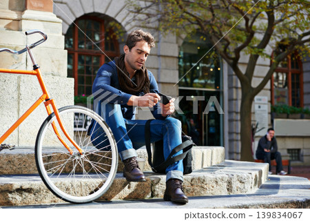 Relax, city and smile with man, smartphone and bicycle with adventure and travel with internet and social media. Commute, outdoor and New York with guy and cellphone with connection and digital app Relax, city and smile with man, smartphone and bicycle with adventure and travel with internet and social media. Commute, outdoor and New York with guy and cellphone with connection and digital app 139834067