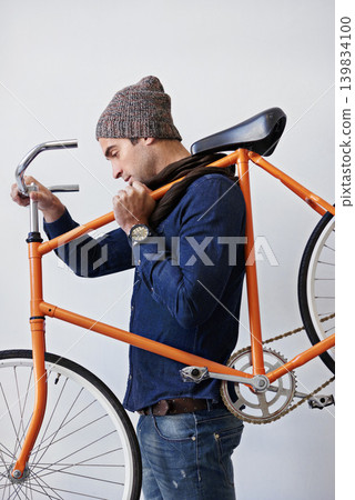 Man, studio and bike for sustainability, transportation or exercise on white background. Hipster cyclist, carbon neutral and eco friendly travel for environmental commute or fitness and trip Man, studio and bike for sustainability, transportation or exercise on white background. Hipster cyclist, carbon neutral and eco friendly travel for environmental commute or fitness and trip 139834100