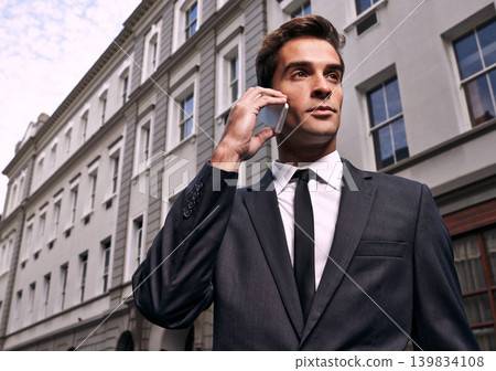 Phone call, corporate and business man in city for consulting, communication and contact. Networking, technology and conversation with male employee in outdoors for feedback, planning and chat Phone call, corporate and business man in city for consulting, communication and contact. Networking, technology and conversation with male employee in outdoors for feedback, planning and chat 139834108