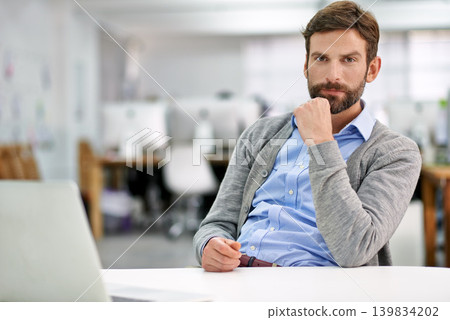 Businessman, confident and portrait by desk for professional worker, friendly and commitment at work. Human resources consultant, face or pride in career in office, ambitious or serious in workplace 139834202
