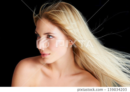 Hair care, wind and beauty of woman, thinking and skincare isolated on a black studio background. Hairstyle, makeup and breeze of blonde model in cosmetics, hairdresser and salon for facial treatment Hair care, wind and beauty of woman, thinking and skincare isolated on a black studio background. Hairstyle, makeup and breeze of blonde model in cosmetics, hairdresser and salon for facial treatment 139834203
