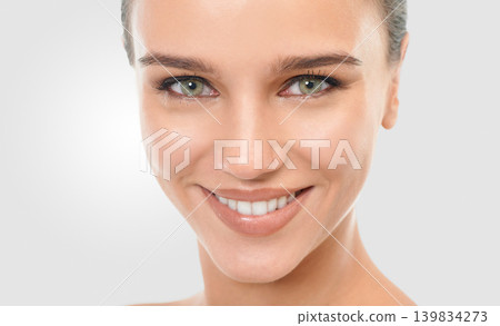 Woman, skincare and glow in studio portrait, confidence and proud of results on white background. Happy female person, shine and smile for facial treatment, cosmetics and dermatology for grooming Woman, skincare and glow in studio portrait, confidence and proud of results on white background. Happy female person, shine and smile for facial treatment, cosmetics and dermatology for grooming 139834273