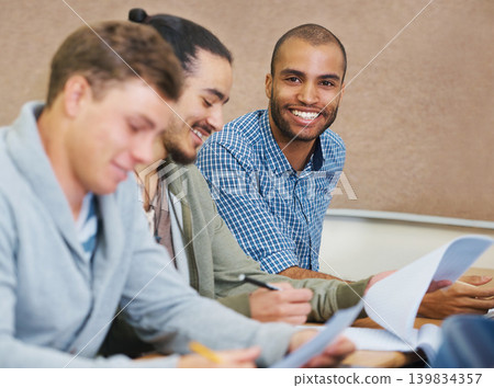 Student, college and man in classroom portrait, information and notes for studying. People, assignment and knowledge in education for learning, problem solving and ideas for solution in assessment Student, college and man in classroom portrait, information and notes for studying. People, assignment and knowledge in education for learning, problem solving and ideas for solution in assessment 139834357