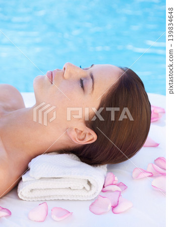 Relax, massage and woman at luxury spa pool with petals for health, wellness balance and holistic treatment. Self care, peace and girl on poolside bed for body, comfort and calm hotel service Relax, massage and woman at luxury spa pool with petals for health, wellness balance and holistic treatment. Self care, peace and girl on poolside bed for body, comfort and calm hotel service 139834648