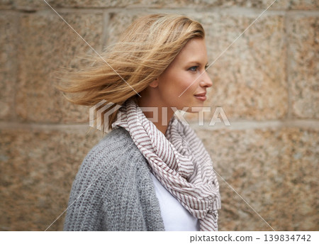 Fashion, wall background and face of woman in city with confidence, trendy clothes and style. Travel, wind and profile of person outdoors for journey on holiday, weekend and vacation in Canada Fashion, wall background and face of woman in city with confidence, trendy clothes and style. Travel, wind and profile of person outdoors for journey on holiday, weekend and vacation in Canada 139834742
