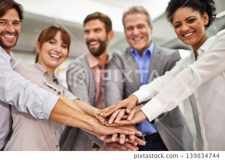 Portrait, collaboration and business people with hands in huddle at office for meeting, motivation or support. Smile, goals and target with happy employee team in workplace for celebration of bonus Portrait, collaboration and business people with hands in huddle at office for meeting, motivation or support. Smile, goals and target with happy employee team in workplace for celebration of bonus 139834744