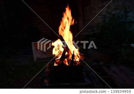 Fire flame isolated on black isolated background - Beautiful yellow, orange and red and red blaze fire flame Fire flame isolated on black isolated background - Beautiful yellow, orange and red and red blaze fire flame 139834959
