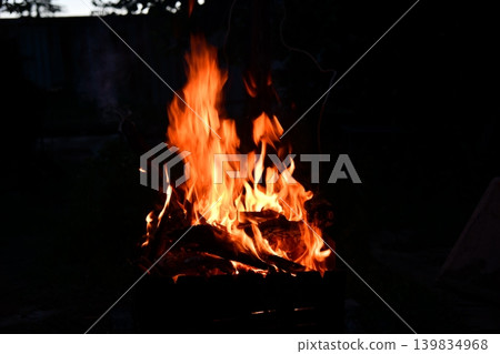 Fire flame isolated on black isolated background - Beautiful yellow, orange and red and red blaze fire flame Fire flame isolated on black isolated background - Beautiful yellow, orange and red and red blaze fire flame 139834968