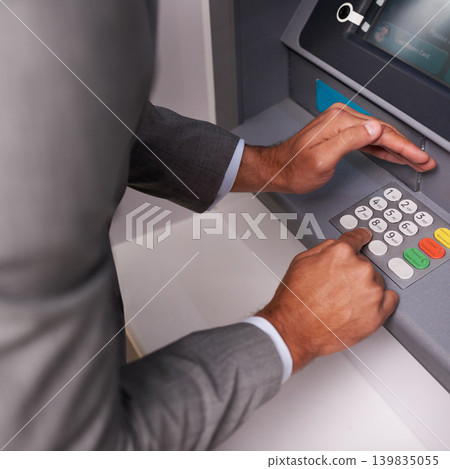 Businessman, hands and typing pin on ATM for banking, privacy or security at money machine. Closeup of man entering digit or secret code for cash withdrawal, deposit or finance at electronic system Businessman, hands and typing pin on ATM for banking, privacy or security at money machine. Closeup of man entering digit or secret code for cash withdrawal, deposit or finance at electronic system 139835055