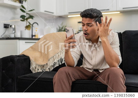Indian man loses mobile game makes facepalm taps try again aims for revenge focuses on next attempt Indian man loses mobile game makes facepalm taps try again aims for revenge focuses on next attempt 139835060