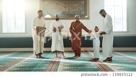 Islam, men and together in mosque for religion, spirituality or learning in Ramadan class for prayer to God. Muslim friends, family or people and community for culture, Eid Mubarak or praise to Allah Islam, men and together in mosque for religion, spirituality or learning in Ramadan class for prayer to God. Muslim friends, family or people and community for culture, Eid Mubarak or praise to Allah 139835122