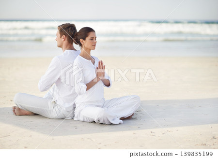 Couple, yoga and sea with meditation, sitting or waves by sand in morning with mindfulness outdoor. Man, woman and peace for namaste with spiritual growth, balance or zen at beach in Cape Town Couple, yoga and sea with meditation, sitting or waves by sand in morning with mindfulness outdoor. Man, woman and peace for namaste with spiritual growth, balance or zen at beach in Cape Town 139835199