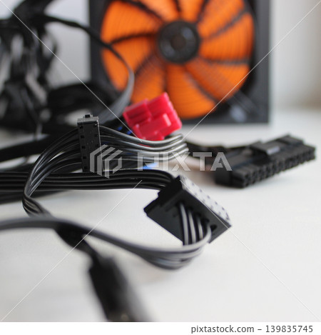 Soft Focus Stock Image Of Intertwined Power Cords, Connectors And Wires For Installing Power Supply In Computer Unit Soft Focus Stock Image Of Intertwined Power Cords, Connectors And Wires For Installing Power Supply In Computer Unit 139835745