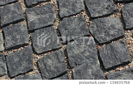 Method of laying rough paving stones without cement mortar Method of laying rough paving stones without cement mortar 139835768