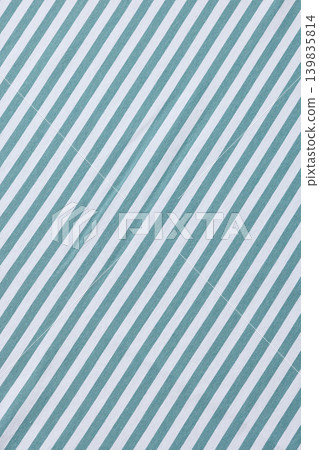 Smooth Blue and White Striped Linen Tablecloth Background. Top View Smooth Blue and White Striped Linen Tablecloth Background. Top View 139835814