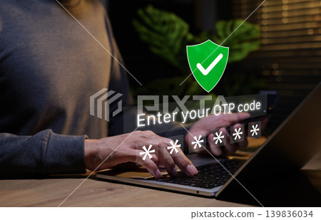 Two-factor authentication and online security concept. Person typing on laptop and OTP code input with password symbols and shield checkmark represent secure login, identity verification process, MFA Two-factor authentication and online security concept. Person typing on laptop and OTP code input with password symbols and shield checkmark represent secure login, identity verification process, MFA 139836034