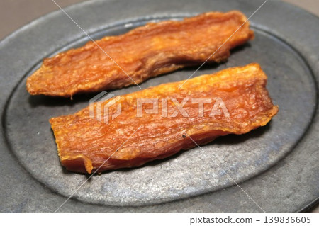 Roasted dried sweet potato Roasted dried sweet potato 139836605
