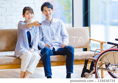 Wheelchair man and woman young couple Wheelchair man and woman young couple 139836734