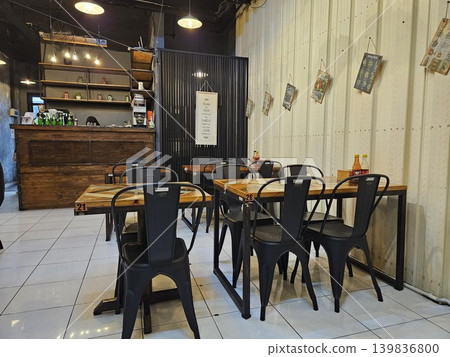 this is interior of a cafe, as one famous cafe in Jakarta city this is interior of a cafe, as one famous cafe in Jakarta city 139836800