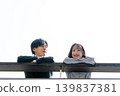 A couple talking on the rooftop 139837381