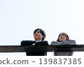 A couple talking on the rooftop 139837385