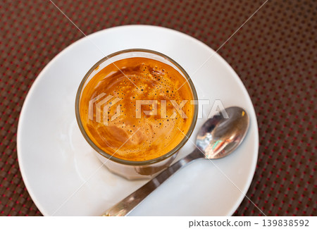 Image of cup of fresh coffee cortado on table 139838592