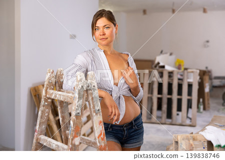 Sexy woman posing in building site Sexy woman posing in building site 139838746