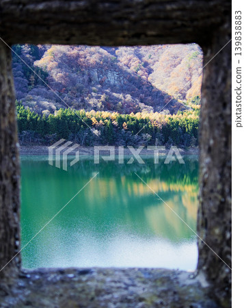 The emerald green lake viewed from the stone window The emerald green lake viewed from the stone window 139838883