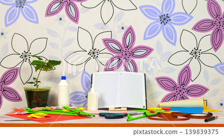 school notebook on a stand among crafts 139839375