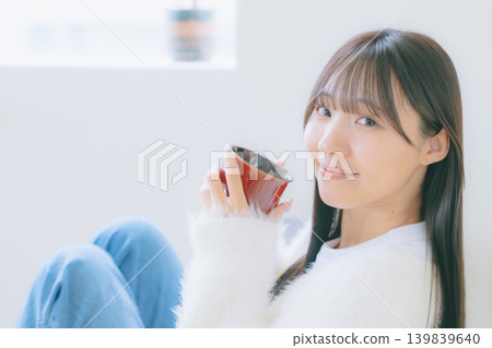 A relaxing woman A relaxing woman 139839640