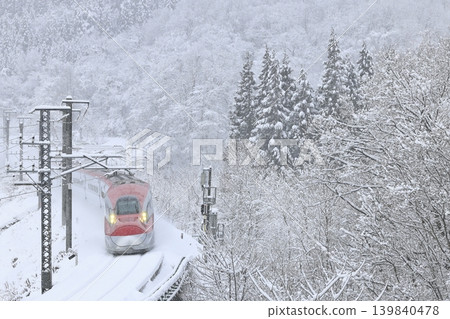 Akita Shinkansen in the snow Akita Shinkansen in the snow 139840478