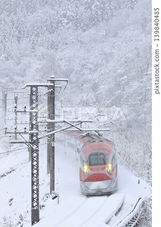Akita Shinkansen in the snow Akita Shinkansen in the snow 139840485