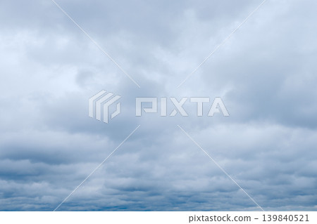 The sky is covered with blue-gray stratus clouds. The sky is covered with blue-gray stratus clouds. 139840521