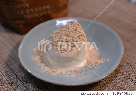 Powdered Dessert on Blue Plate Powdered Dessert on Blue Plate 139840936