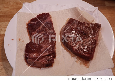 Raw Steaks on Paper Towel Raw Steaks on Paper Towel 139840953