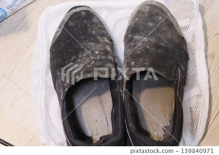 Dirty Work Shoes on Mesh Surface 139840971