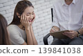 Woman smile counseling therapy clipboard conversation happiness support mental health woman smile counseling therapy session with clipboard 139841038