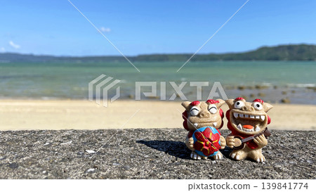 Shisa statues and the sea: Okinawan scenery, Yagaji Island, Nago City, Okinawa Prefecture 139841774