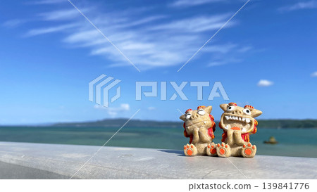 Shisa statues and the sea: Okinawan scenery, Yagaji Island, Nago City, Okinawa Prefecture 139841776
