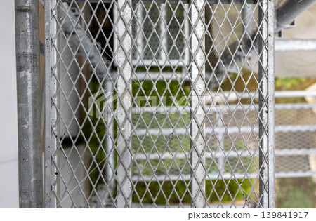 Steel scaffolding at a construction site Steel scaffolding at a construction site 139841917