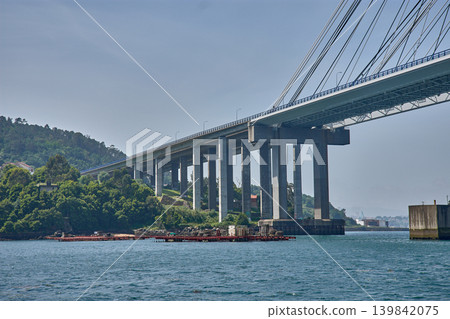Cable-stayed structure of the famous Rande Bridge connecting the two banks of the Vigo estuary Cable-stayed structure of the famous Rande Bridge connecting the two banks of the Vigo estuary 139842075