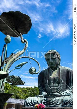 Great Buddha Daibutsu and lotus sculpture at Kotoku-in temple, Kamakura Great Buddha Daibutsu and lotus sculpture at Kotoku-in temple, Kamakura 139843802