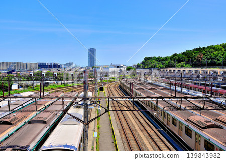 View of the Tokyu Corporation's Nagatsuta train depot from an overpass on the Tokyu Den-en-toshi Line. View of the Tokyu Corporation's Nagatsuta train depot from an overpass on the Tokyu Den-en-toshi Line. 139843982